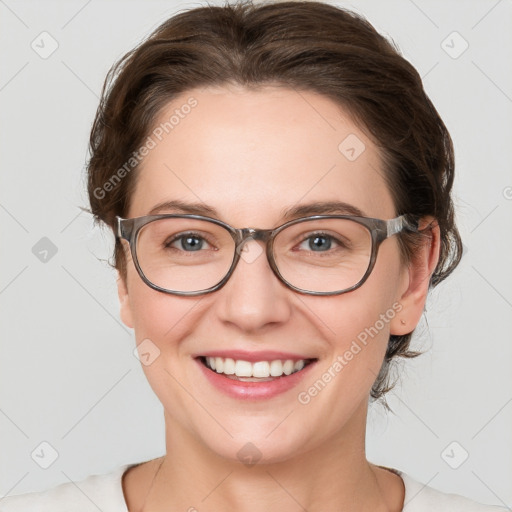 Joyful white young-adult female with medium  brown hair and blue eyes