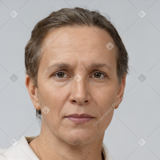 Joyful white adult female with short  brown hair and brown eyes