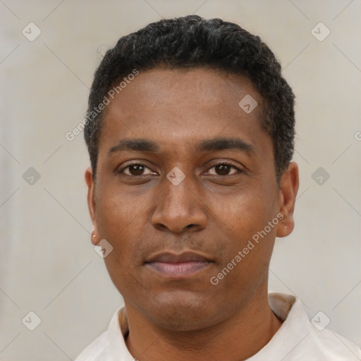 Neutral latino young-adult male with short  black hair and brown eyes