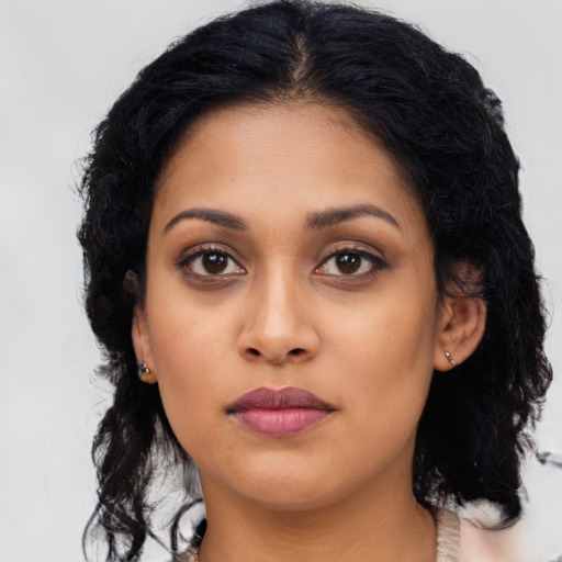 Neutral latino young-adult female with long  black hair and brown eyes