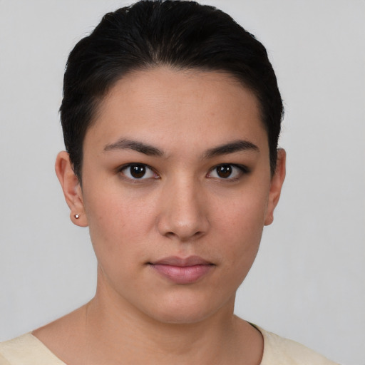 Neutral white young-adult female with short  black hair and brown eyes