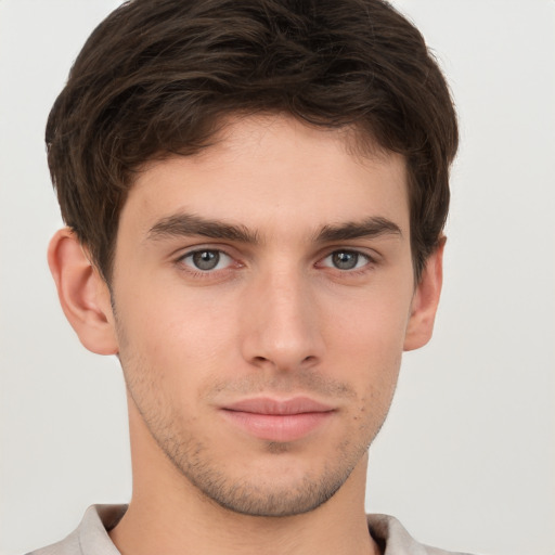 Neutral white young-adult male with short  brown hair and brown eyes