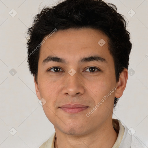 Joyful latino young-adult male with short  brown hair and brown eyes