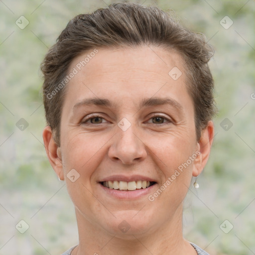 Joyful white adult female with short  brown hair and brown eyes