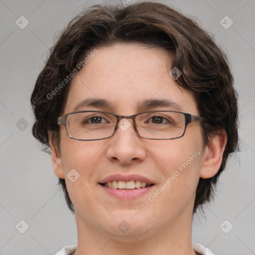 Joyful white adult female with medium  brown hair and green eyes