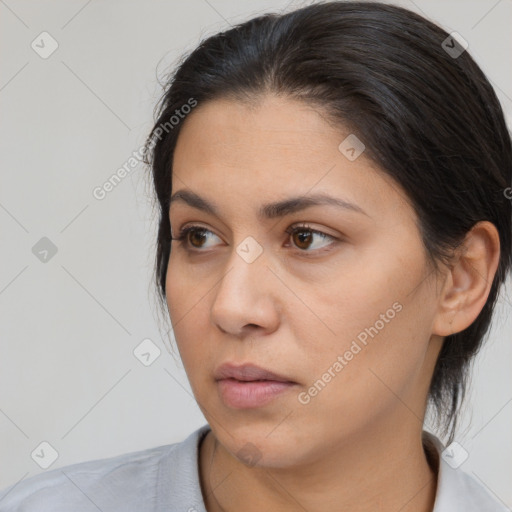 Neutral asian young-adult female with medium  brown hair and brown eyes