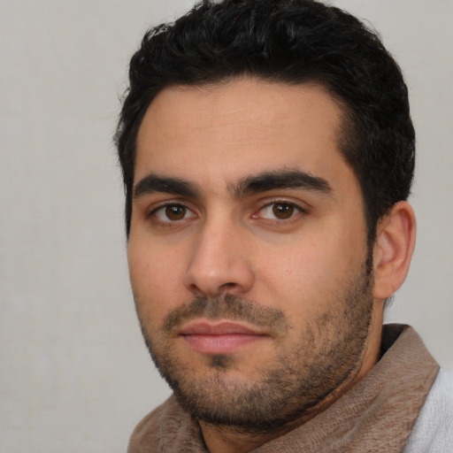 Neutral white young-adult male with short  black hair and brown eyes