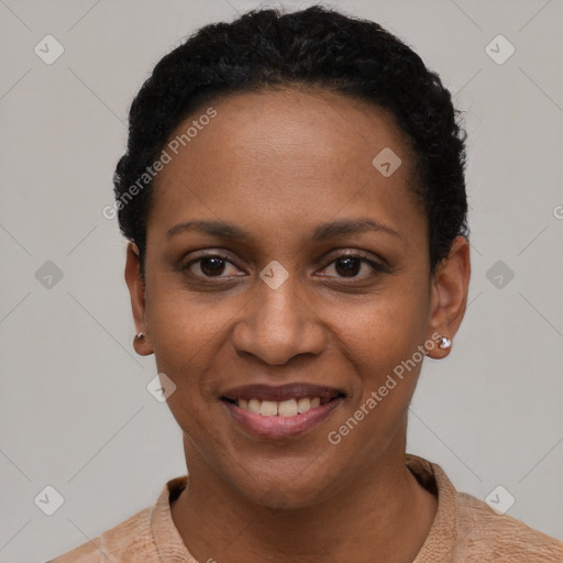 Joyful black young-adult female with short  black hair and brown eyes