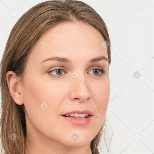 Joyful white young-adult female with long  brown hair and blue eyes