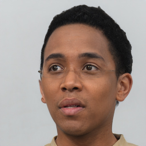 Neutral black young-adult male with short  black hair and brown eyes