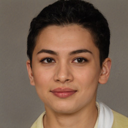 Joyful latino young-adult female with short  brown hair and brown eyes