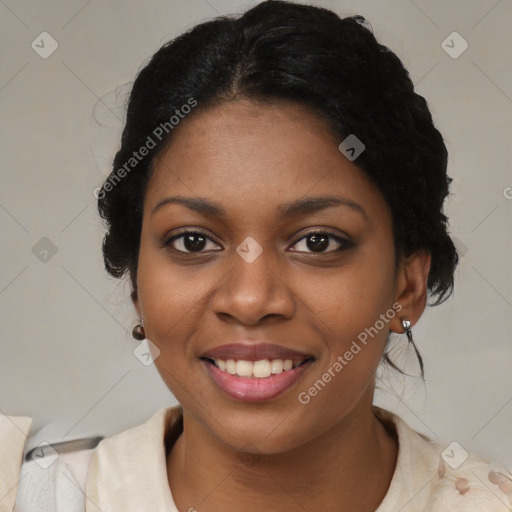 Joyful black young-adult female with medium  black hair and brown eyes