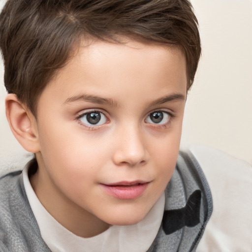 Joyful white child female with short  brown hair and brown eyes