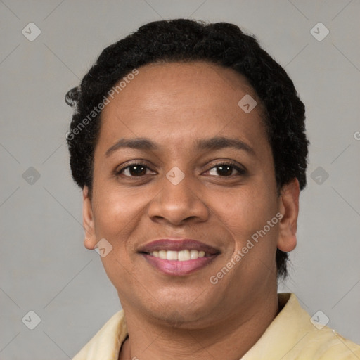 Joyful latino young-adult female with short  black hair and brown eyes