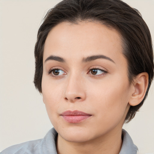 Neutral white young-adult female with medium  brown hair and brown eyes