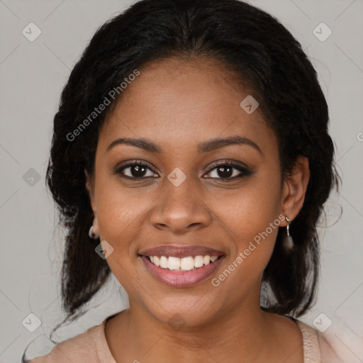 Joyful black young-adult female with medium  brown hair and brown eyes