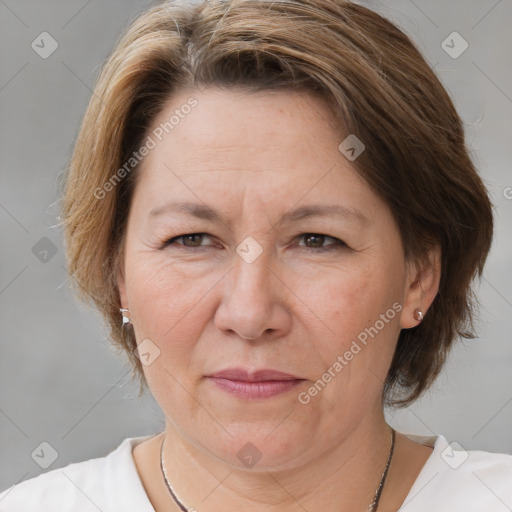 Joyful white adult female with short  brown hair and brown eyes