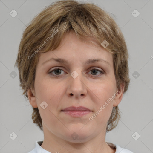 Joyful white adult female with medium  brown hair and grey eyes