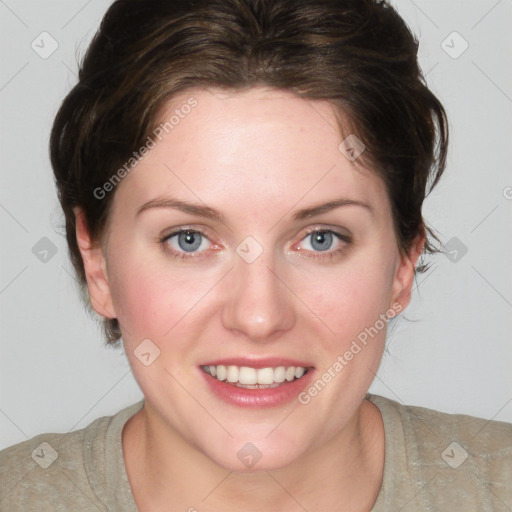 Joyful white young-adult female with medium  brown hair and blue eyes