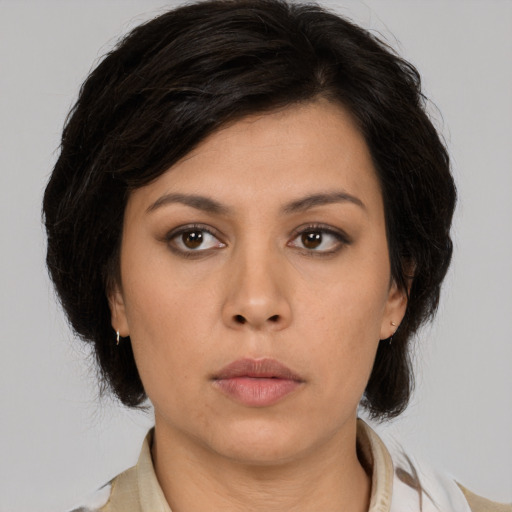 Neutral asian young-adult female with medium  brown hair and brown eyes