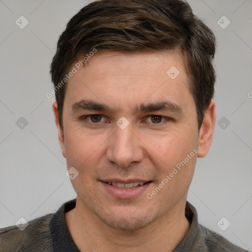 Joyful white adult male with short  brown hair and grey eyes