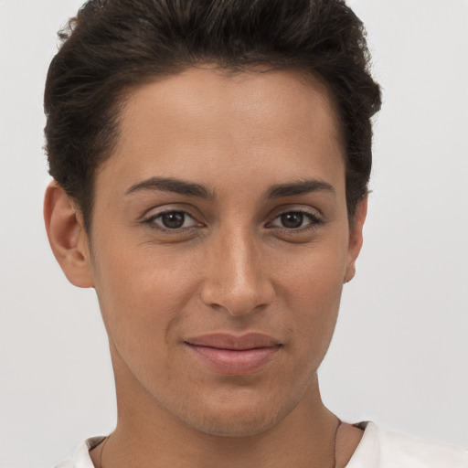 Joyful white young-adult female with short  brown hair and brown eyes