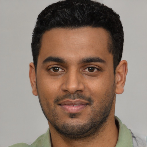 Neutral black young-adult male with short  black hair and brown eyes