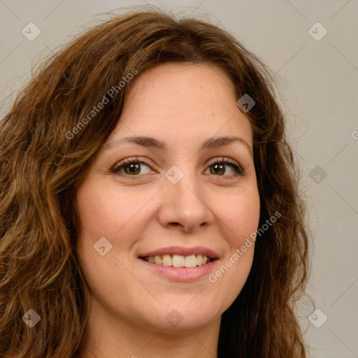 Joyful white young-adult female with long  brown hair and green eyes