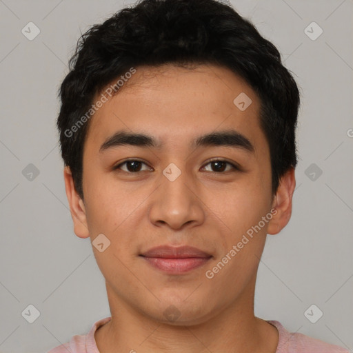 Joyful asian young-adult male with short  black hair and brown eyes