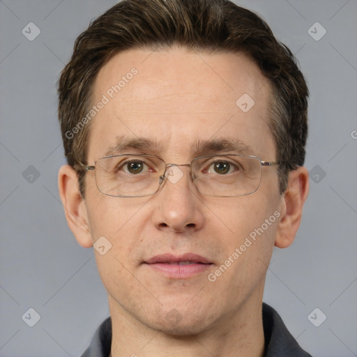 Joyful white adult male with short  brown hair and grey eyes