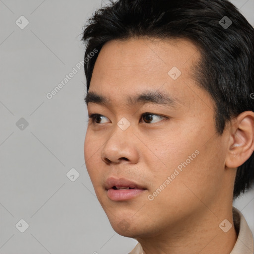 Neutral asian young-adult male with short  black hair and brown eyes