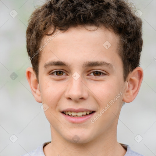 Joyful white child male with short  brown hair and brown eyes