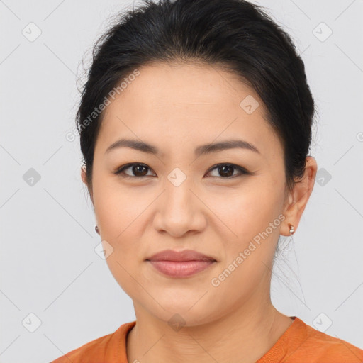 Joyful asian young-adult female with short  brown hair and brown eyes