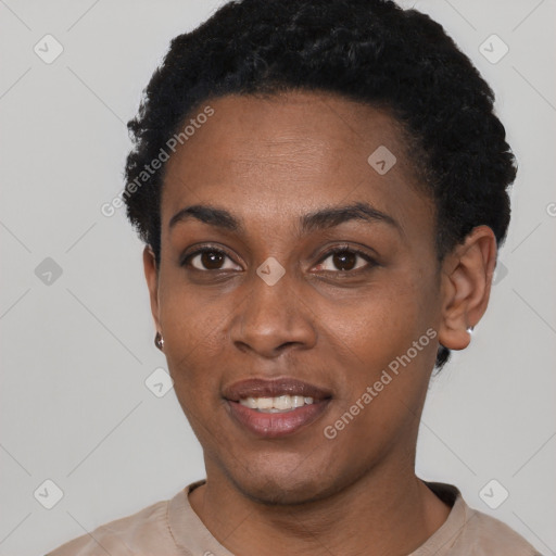 Joyful black young-adult female with short  black hair and brown eyes