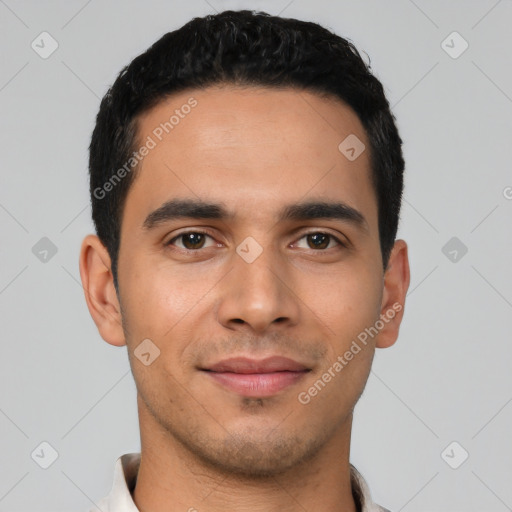 Joyful latino young-adult male with short  black hair and brown eyes