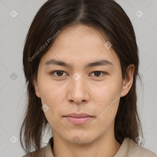 Neutral asian young-adult female with medium  brown hair and brown eyes