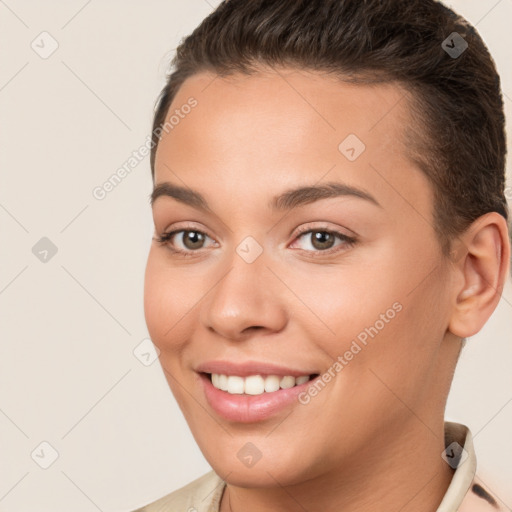 Joyful white young-adult female with short  brown hair and brown eyes