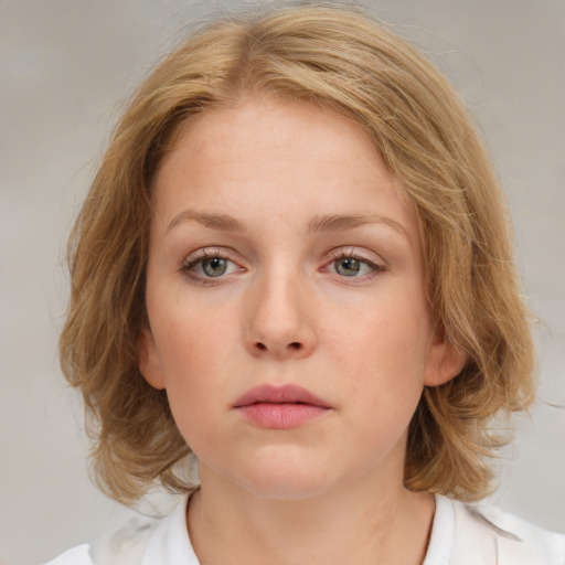 Neutral white young-adult female with medium  brown hair and blue eyes