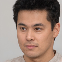 Neutral asian young-adult male with short  brown hair and brown eyes