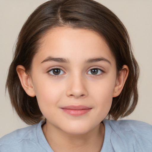 Joyful white child female with medium  brown hair and brown eyes