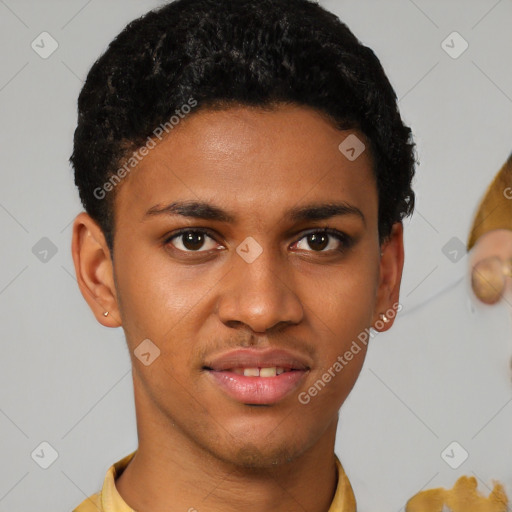 Joyful latino young-adult male with short  brown hair and brown eyes