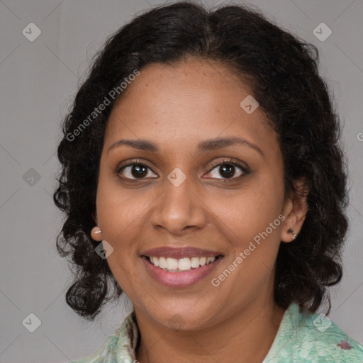 Joyful black young-adult female with medium  brown hair and brown eyes