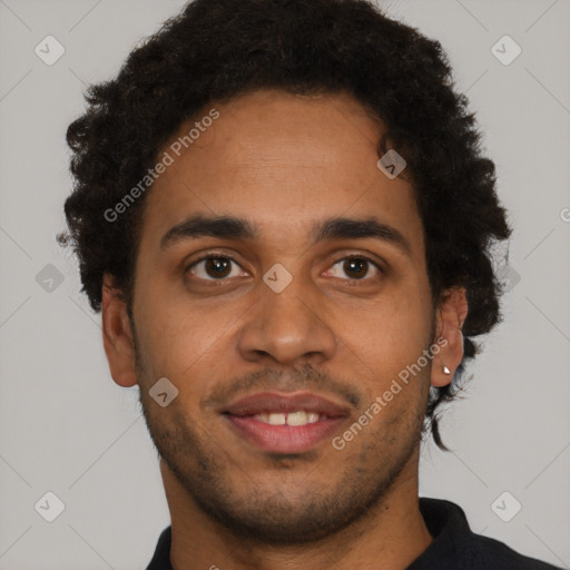 Joyful latino young-adult male with short  brown hair and brown eyes
