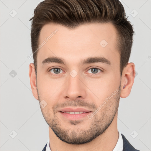 Joyful white young-adult male with short  brown hair and brown eyes