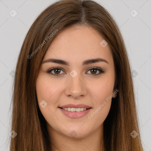 Joyful white young-adult female with long  brown hair and brown eyes