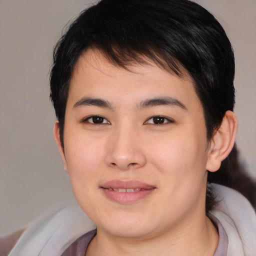 Joyful asian young-adult male with medium  brown hair and brown eyes