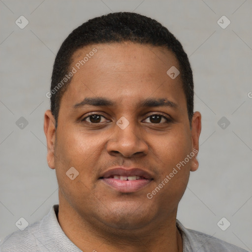 Joyful latino young-adult male with short  brown hair and brown eyes