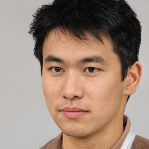 Neutral asian young-adult male with short  brown hair and brown eyes