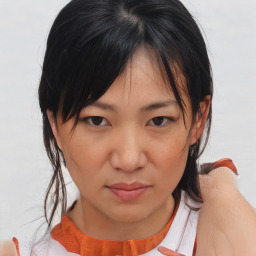 Neutral asian young-adult female with medium  brown hair and brown eyes