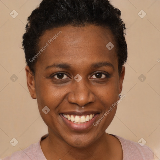 Joyful black young-adult female with short  black hair and brown eyes